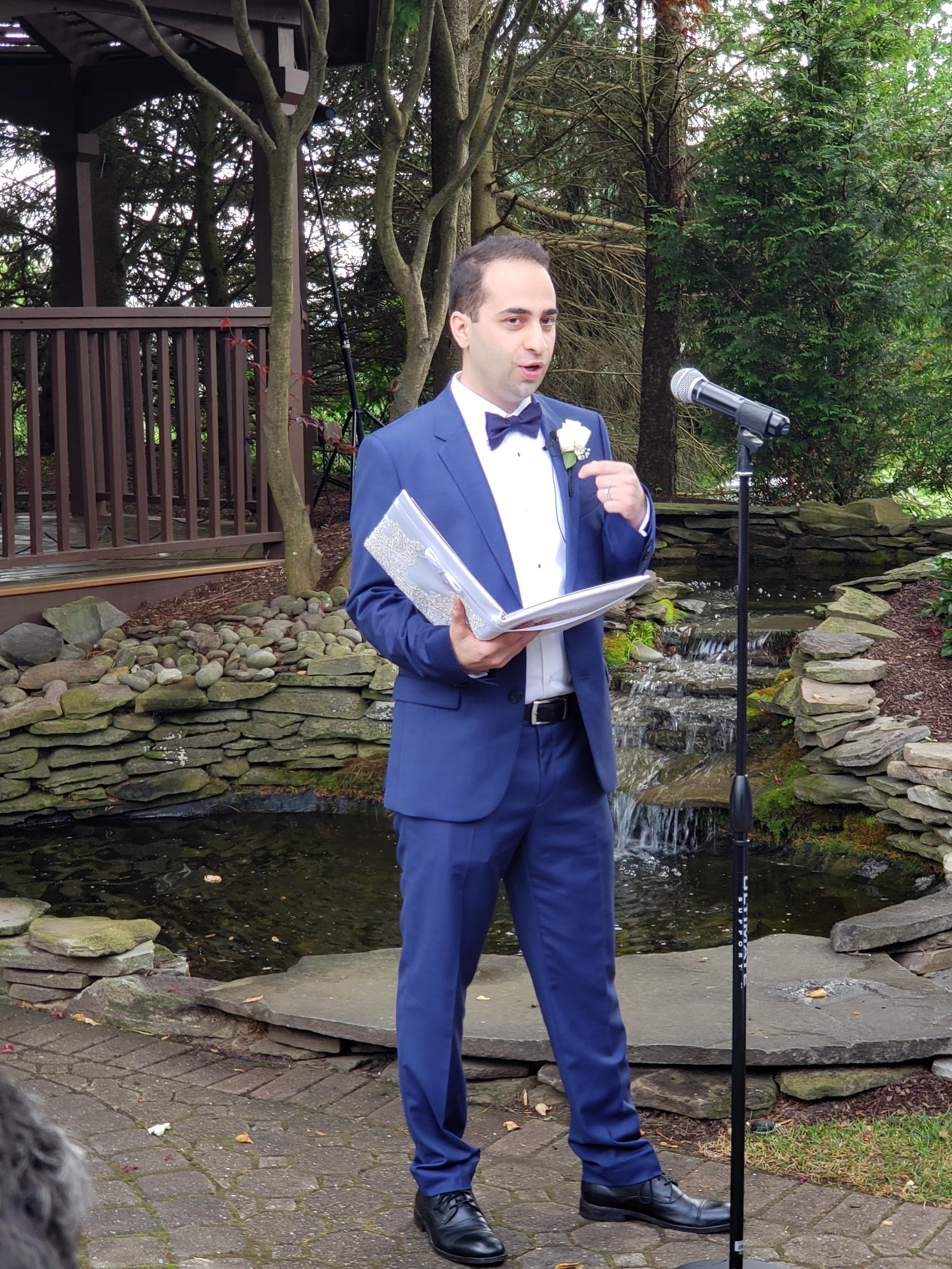 ARII officiant performing Persian wedding ceremony at outdoor garden venue